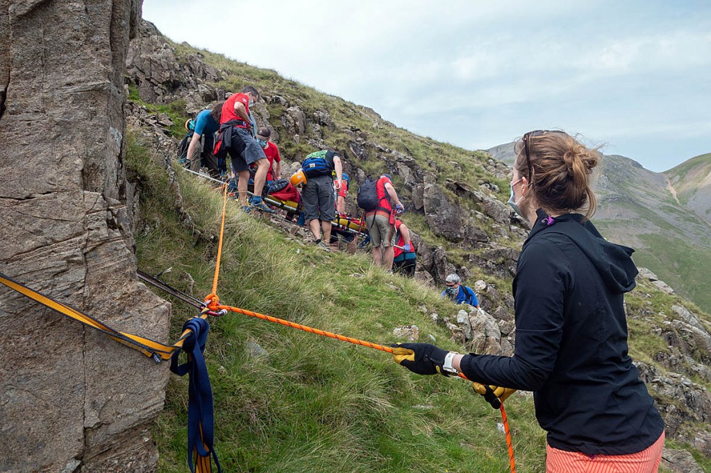 The stretcher was secured by ropes as it was lowered. Photo: Keswick MRT The stretcher was secured by ropes as it was lowered. Photo: Keswick MRT