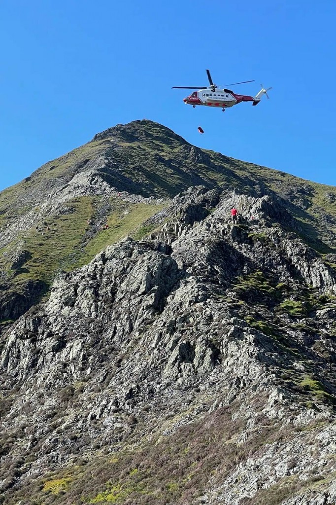 The Coastguard helicopter in action above the ridge. Photo: Keswick MRT