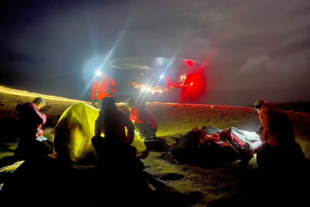 The Coastguard helicopter with rescuers at the scene. Photo: Keswick MRT