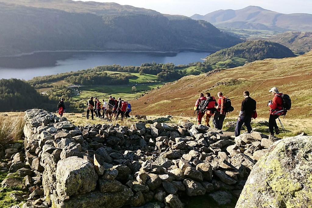 Rescuers stretcher the walker down towards Swirls car park. Photo: Keswick MRT Rescuers stretcher the walker down towards Swirls car park. Photo: Keswick MRT