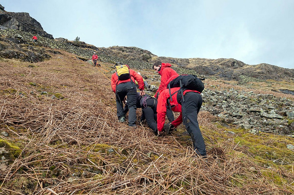 The walkers were helped to safety using ropes. Photo: Keswick MRT