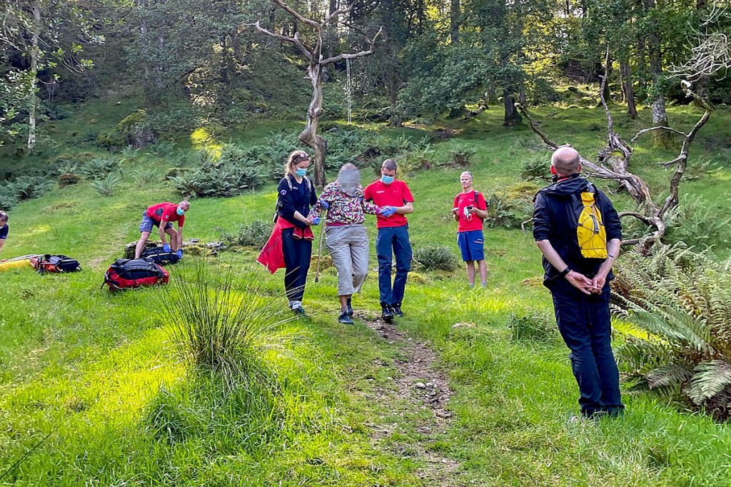 The walker is helped from the woods in Borrowdale. Photo: Keswick MRT