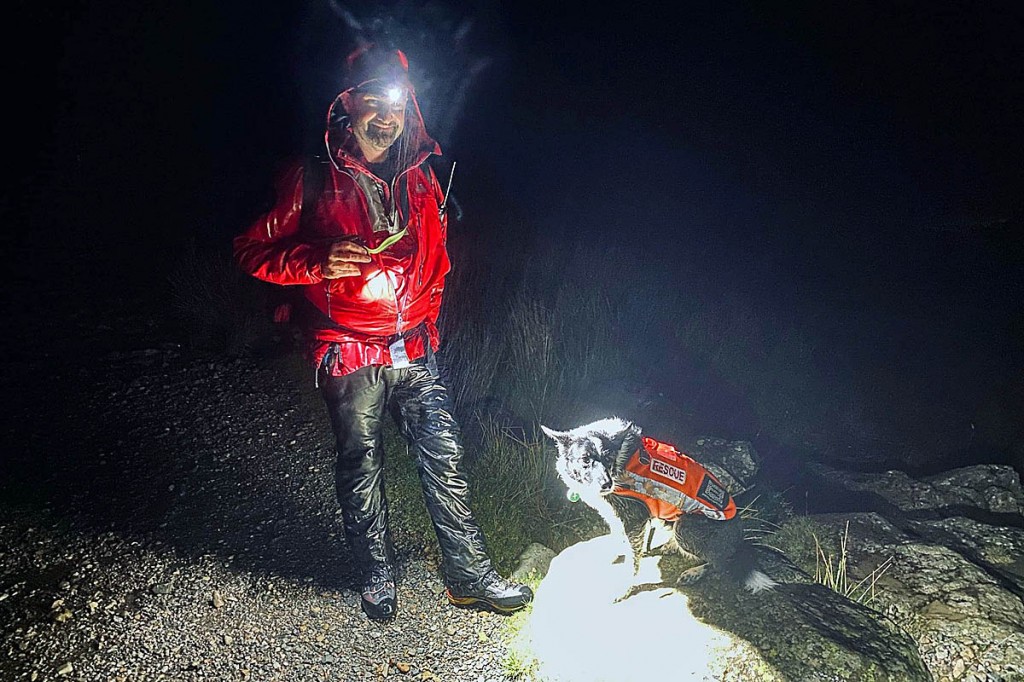 A Keswick team member and search dog during the operation to find the walkers. Photo: Keswick MRT