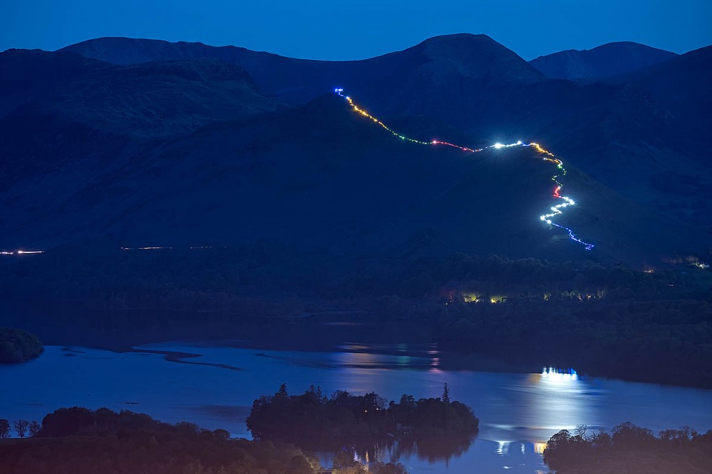 The spine of Cat Bells is illuminated by the torches. Photo: Nick Landells Lakeland Photo Walks