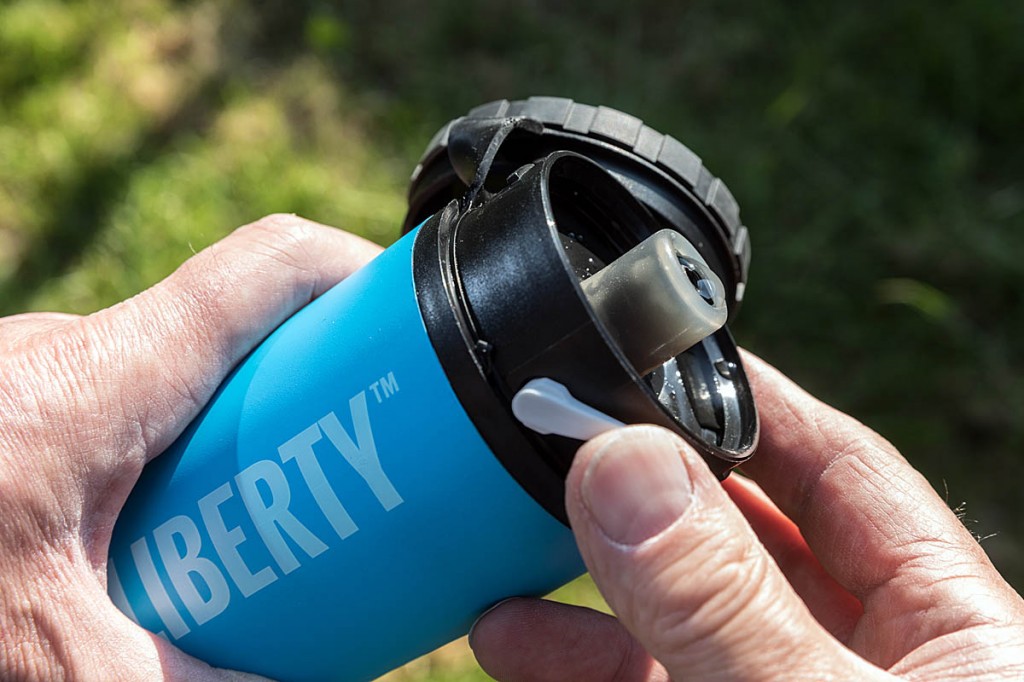 A small lever on the side of the bottle opens the drinking valve. Photo: Bob Smith/grough A small lever on the side of the bottle opens the drinking valve. Photo: Bob Smith/grough