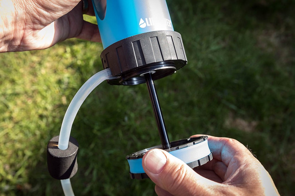 The scavenger tube pushes on to a spigot on the bottle's base. Photo: Bob Smith/grough The scavenger tube pushes on to a spigot on the bottle's base. Photo: Bob Smith/grough