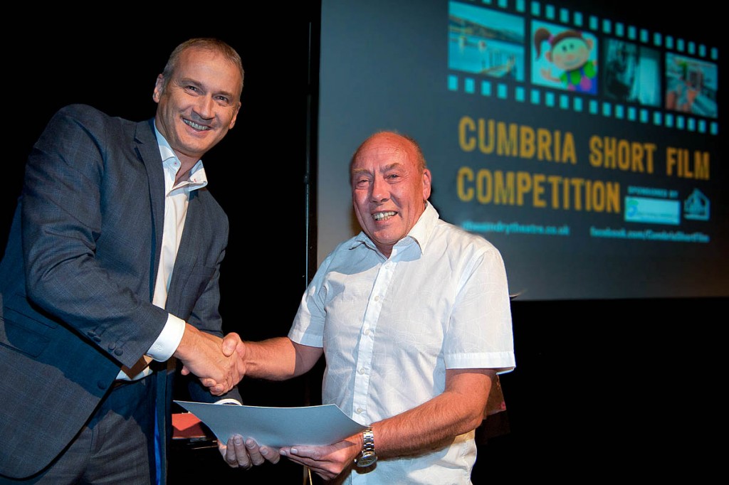 Dave Freeborn, right, receives his award from Guy Pocock of event sponsors Lakes Training Solutions. Photo: Florence Acland Photography