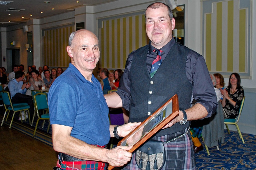 Mario DiMaio receives the award Mario DiMaio receives the award