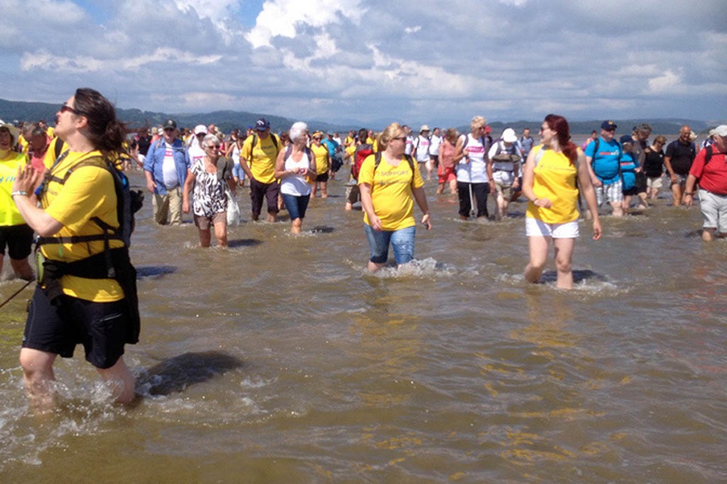 Walkers must be prepared to get their feet, and more, wet on the walk across the bay