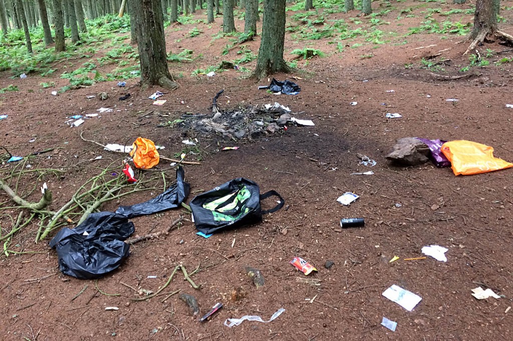 Rubbish and fire damage at an abandoned campsite near Bonaly Reservoir in the Pentlands. Photo: Pentlands Regional Park