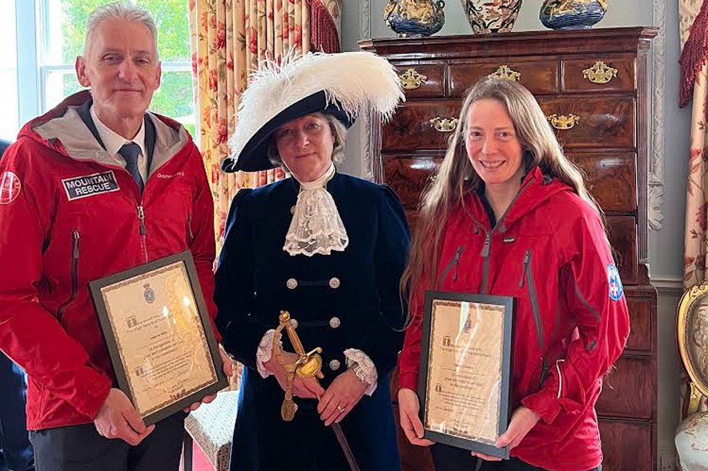The two rescuers receive their awards from the High Sheriff. Photo: NNPMRT