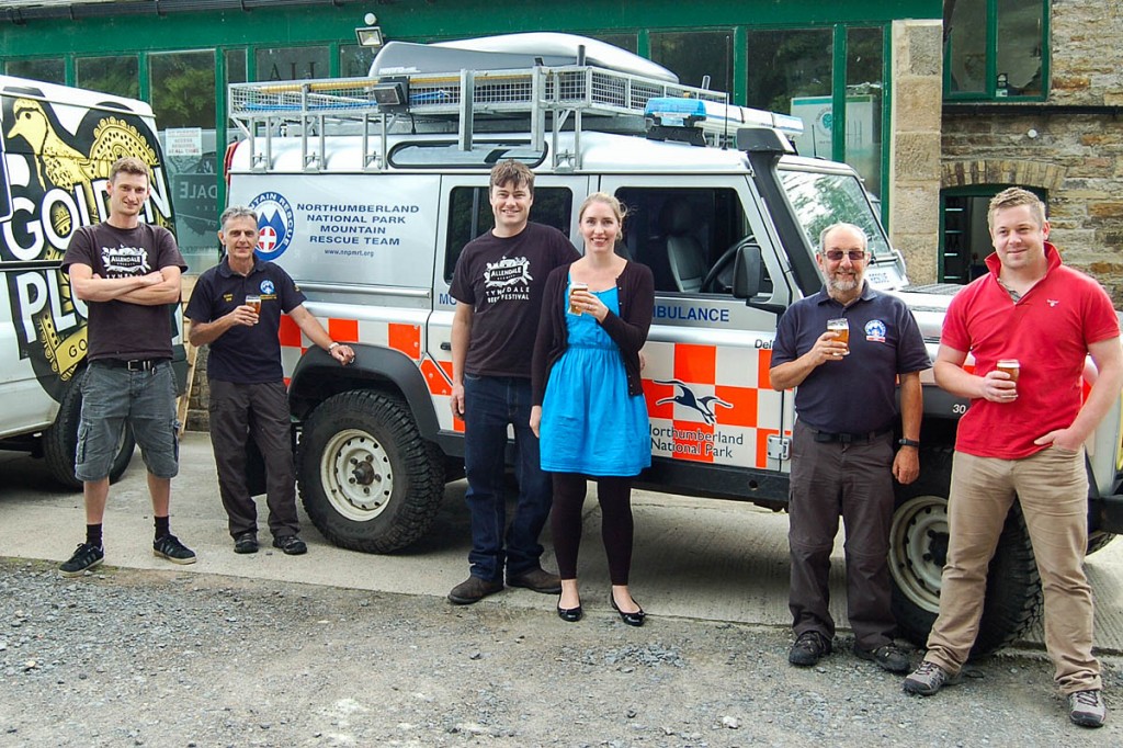 Rescue team members Steve Old, second from left, Geoff Forrester, fifth from left, and Chris Aird, right, are joined by, from left, Neil Thomas, Tom Hick and Lucy Hick from Allendale Brewery