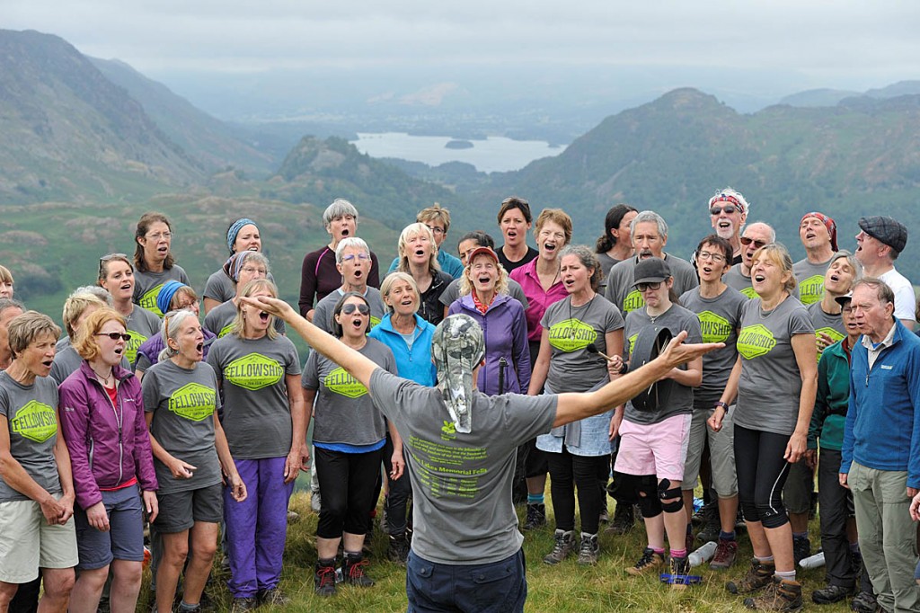 The choir performs on top of Thorneythwaite Fell in Borrowdale, led by Dave Camlin. Photo: North News and Pictures