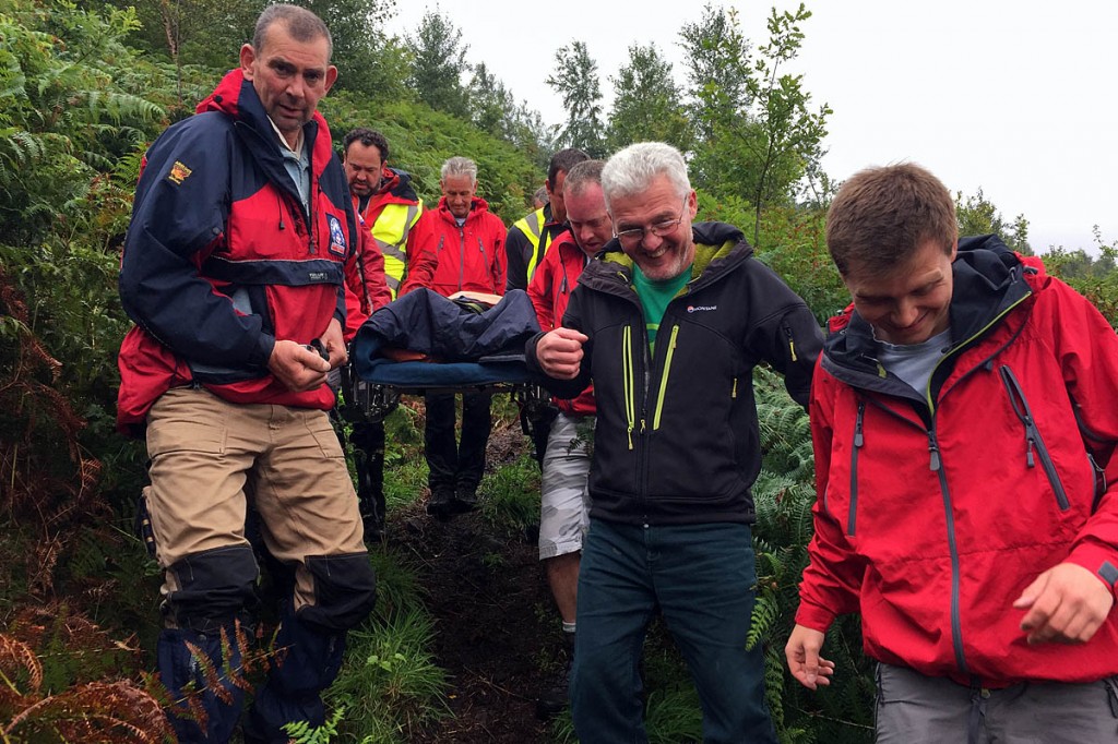 Rescuers stretcher the injured walker down the steep slope: Photo: Northumberland NPMRT