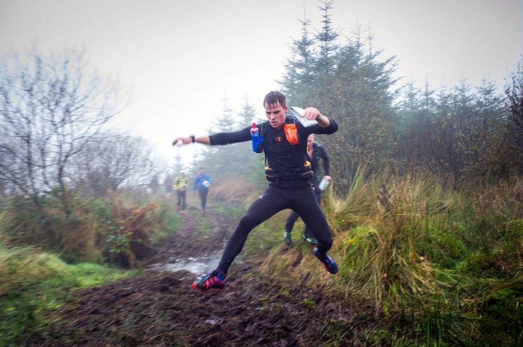 A competitor leaps across one of the event's bogs. Photo: OMM A competitor leaps across one of the event's bogs. Photo: OMM