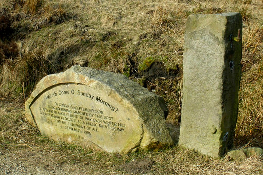An inscribed stone commemorates the original demonstration