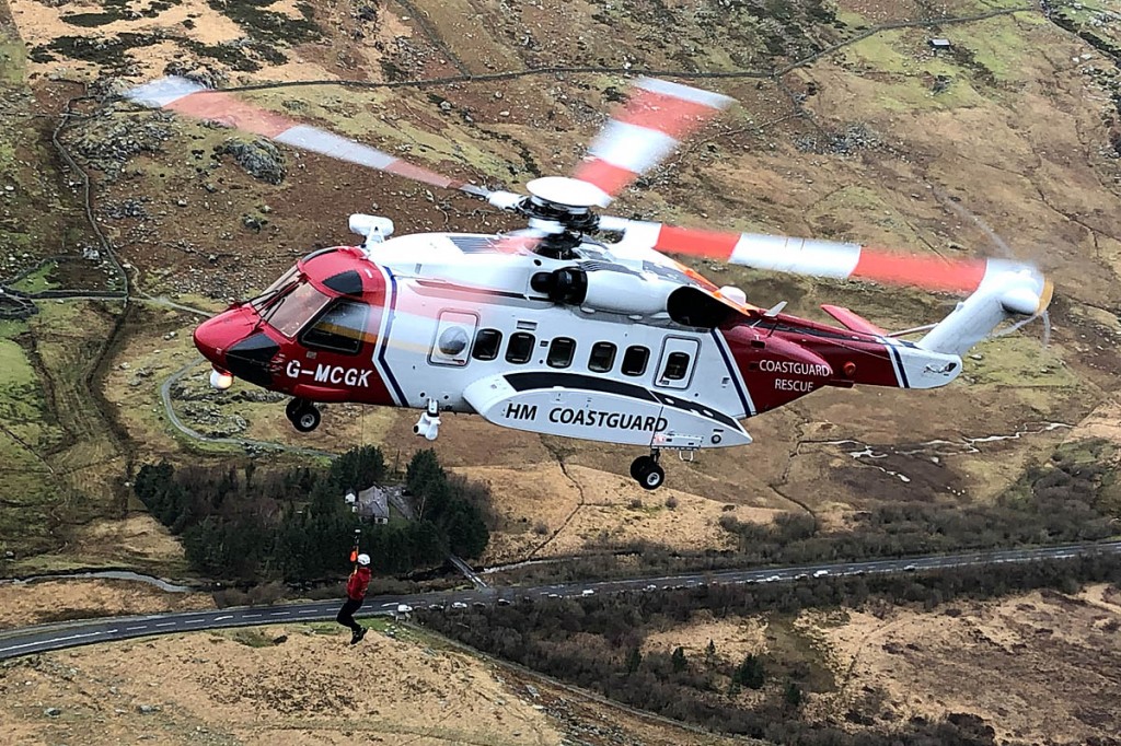 A rescue team member is winched at the site. Photo: Ogwen Valley MRO A rescue team member is winched at the site. Photo: Ogwen Valley MRO