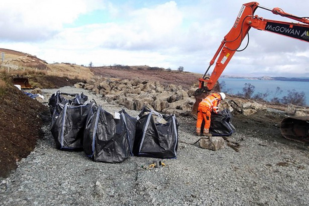 A worker bags stone at The Storr project. Photo: Outdoor Access Trust for Scotland
