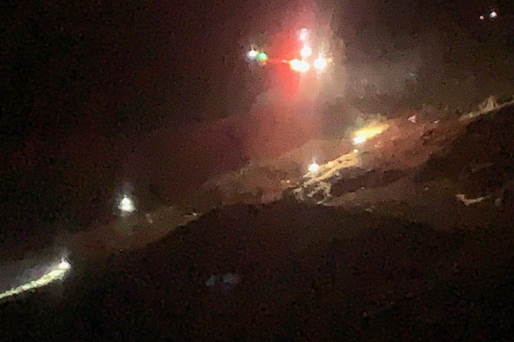 A Coastguard helicopter airlifted the injured rescuer from the mountainside. Photo: Patterdale MRT A Coastguard helicopter airlifted the injured rescuer from the mountainside. Photo: Patterdale MRT