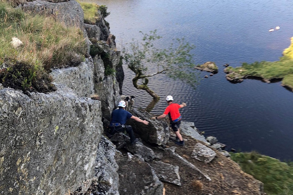 Rescuers approach the stranded sheep. Photo: Patterdale MRT Rescuers approach the stranded sheep. Photo: Patterdale MRT