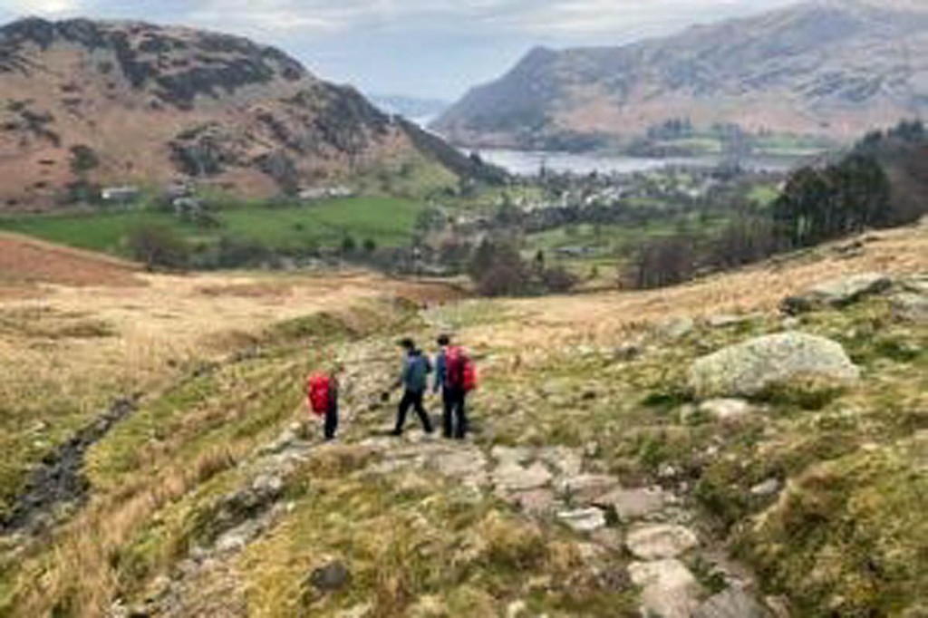 Rescuers met the descending walkers. Photo: Patterdale MRT Rescuers met the descending walkers. Photo: Patterdale MRT