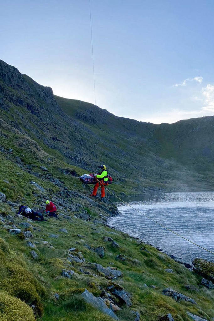 The helicopter winchman at the site next to Red Tarn. Photo: Patterdale MRT