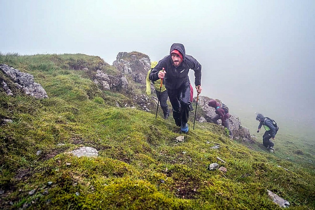 Paul Tierney tackles the eastern fells and battles the weather during the early part of his challenge. Photo: Andy Jackson