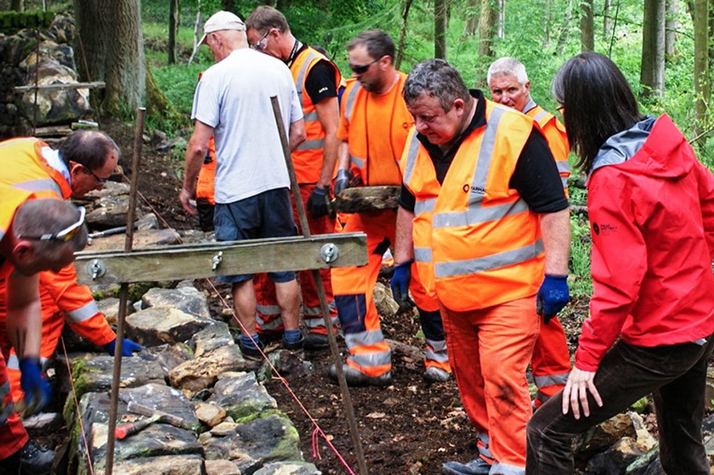 Tarmac volunteers with Peak District national park chief executive Sarah Fowler Tarmac volunteers with Peak District national park chief executive Sarah Fowler