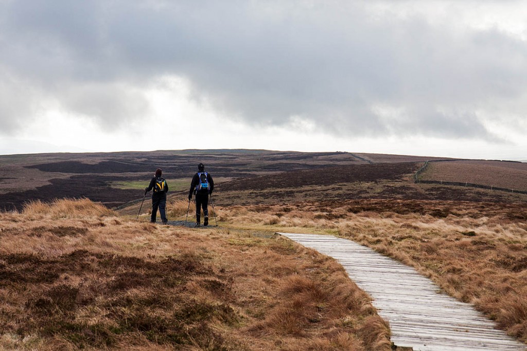 Walkers on the Pennine Way in the Yorkshire Dales Walkers on the Pennine Way in the Yorkshire Dales
