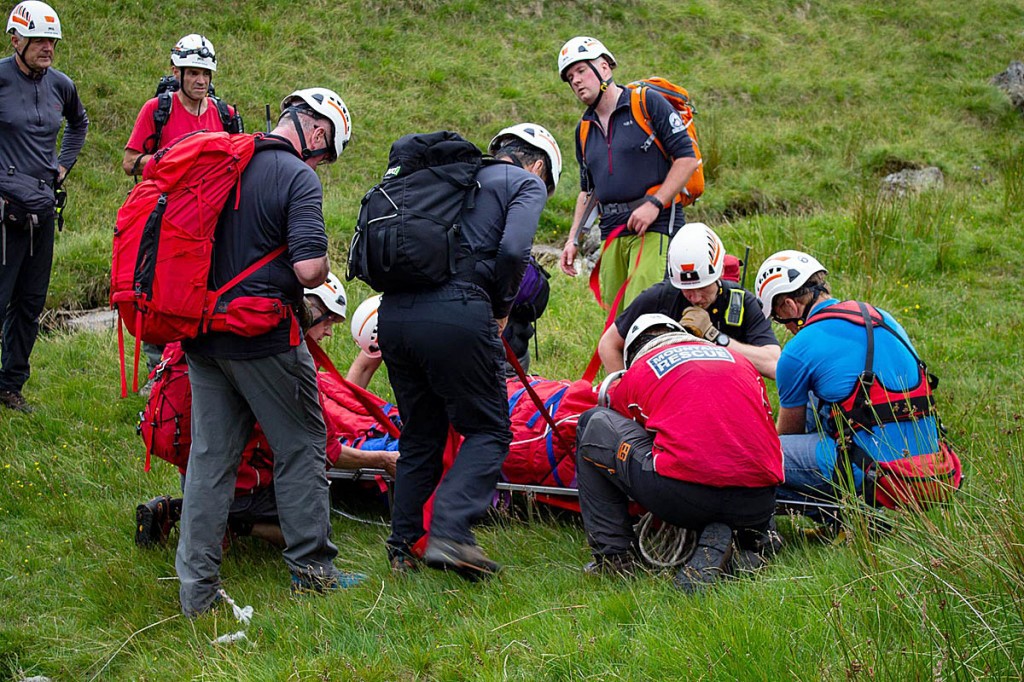 Rescuers with the injured walker at the scene above Mardale Head. Photo: Penrith MRT Rescuers with the injured walker at the scene above Mardale Head. Photo: Penrith MRT