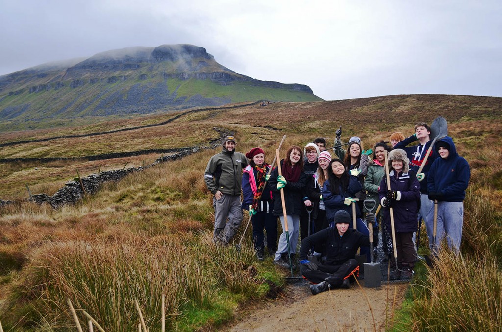 The teenagers gather on the path leading up Pen-y-ghent. Photo: YDNPA