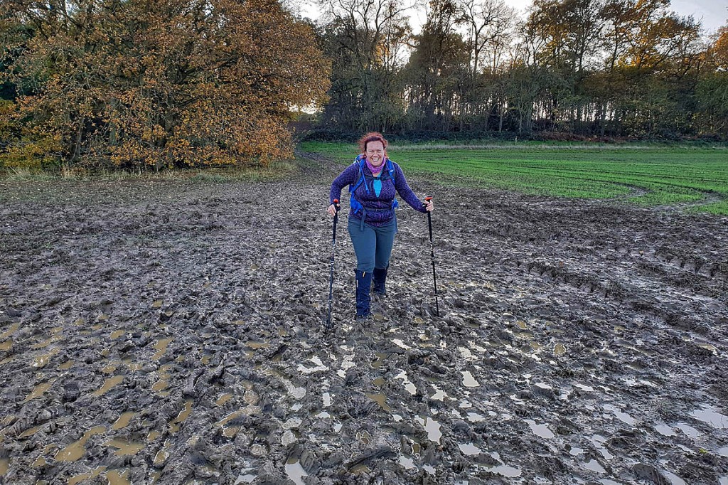 A walker negotiates a muddy path in Stamford, Lincolnshire. Photo: Ramblers