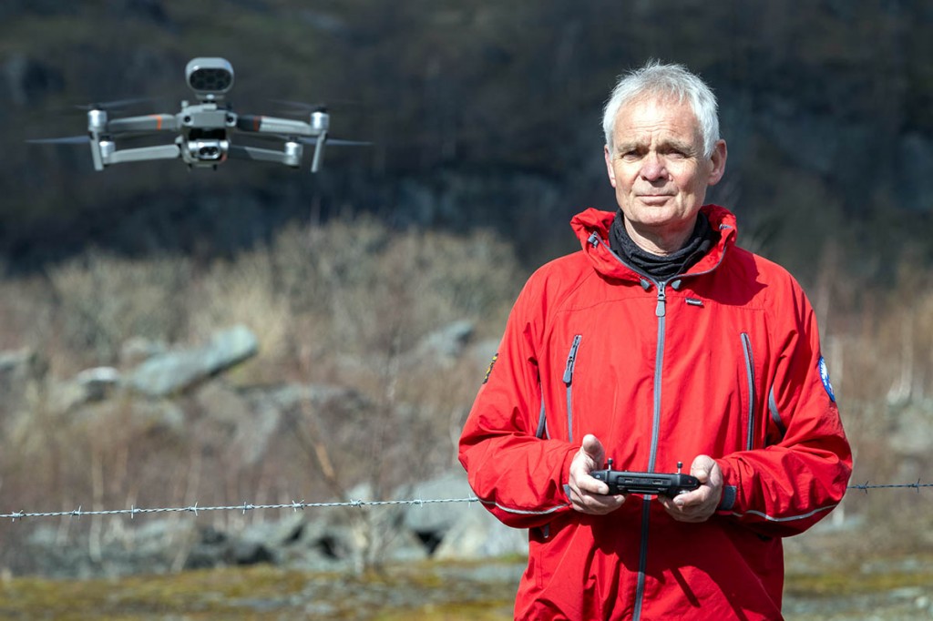 Richard Warren in action flying a drone used in mountain rescue callouts. Photo: Bob Smith Photography