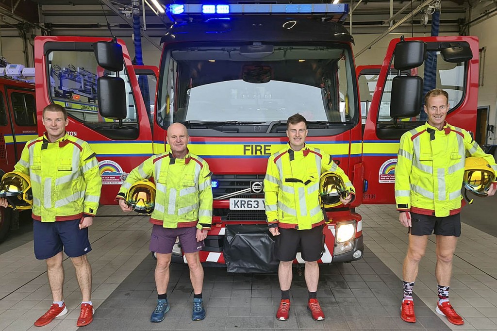 Ricky Lightfoot, right, with fellow charity challenge firefighters