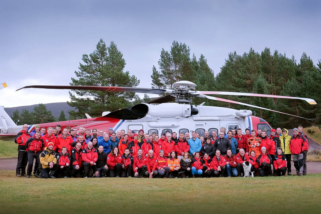 Rescuers line up at the conference with the Coastguard helicopter Rescuers line up at the conference with the Coastguard helicopter
