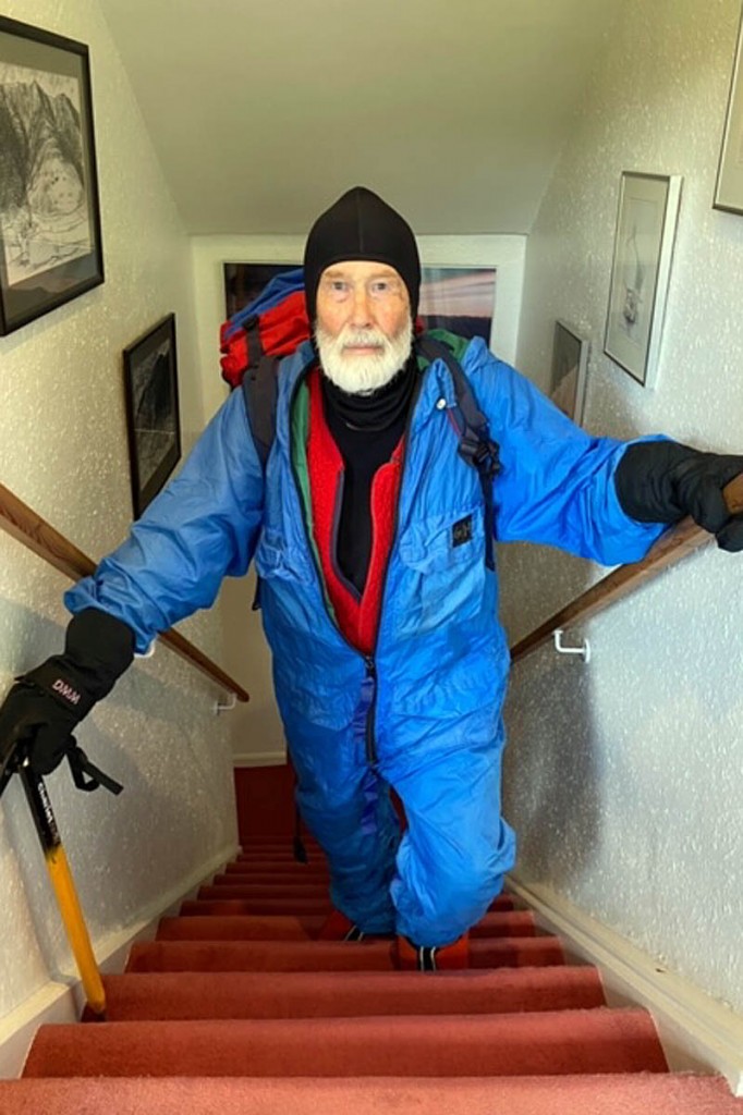 Sir Chris Bonington wears his original Everest outfit as he climbs his stairs Sir Chris Bonington wears his original Everest outfit as he climbs his stairs