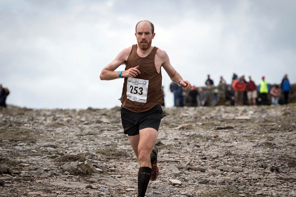 Murray Strain leaves the Ingleborough summit checkpoint. Photo: Bob Smith/grough
