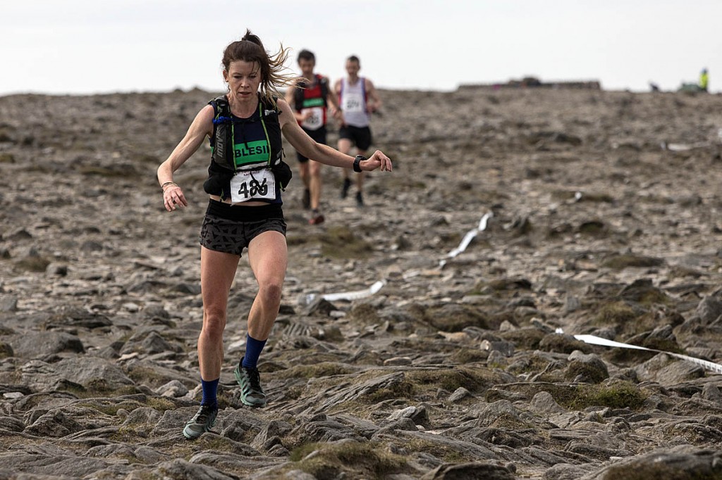 Sarah McCormack starts her descent from Ingleborough. Photo: Bob Smith/grough Sarah McCormack starts her descent from Ingleborough. Photo: Bob Smith/grough