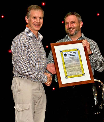 Steve Penny, left, receives his award from Simon Steer. Photo: David Williams/Reiver Photography Steve Penny, left, receives his award from Simon Steer. Photo: David Williams/Reiver Photography