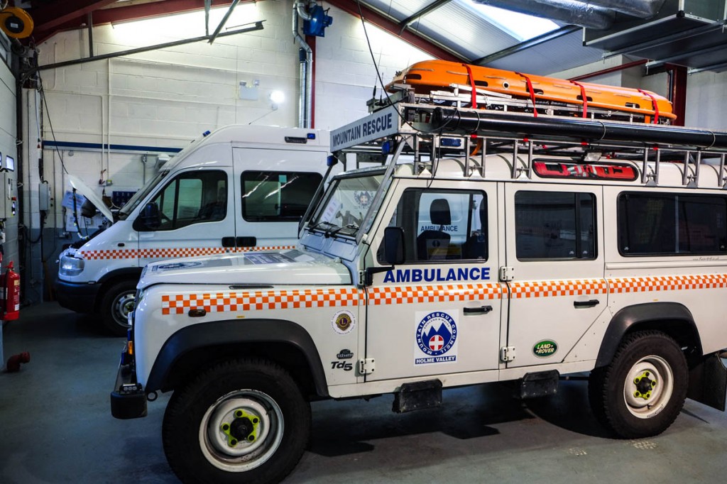 The building has space for the team's vehicles The building has space for the team's vehicles