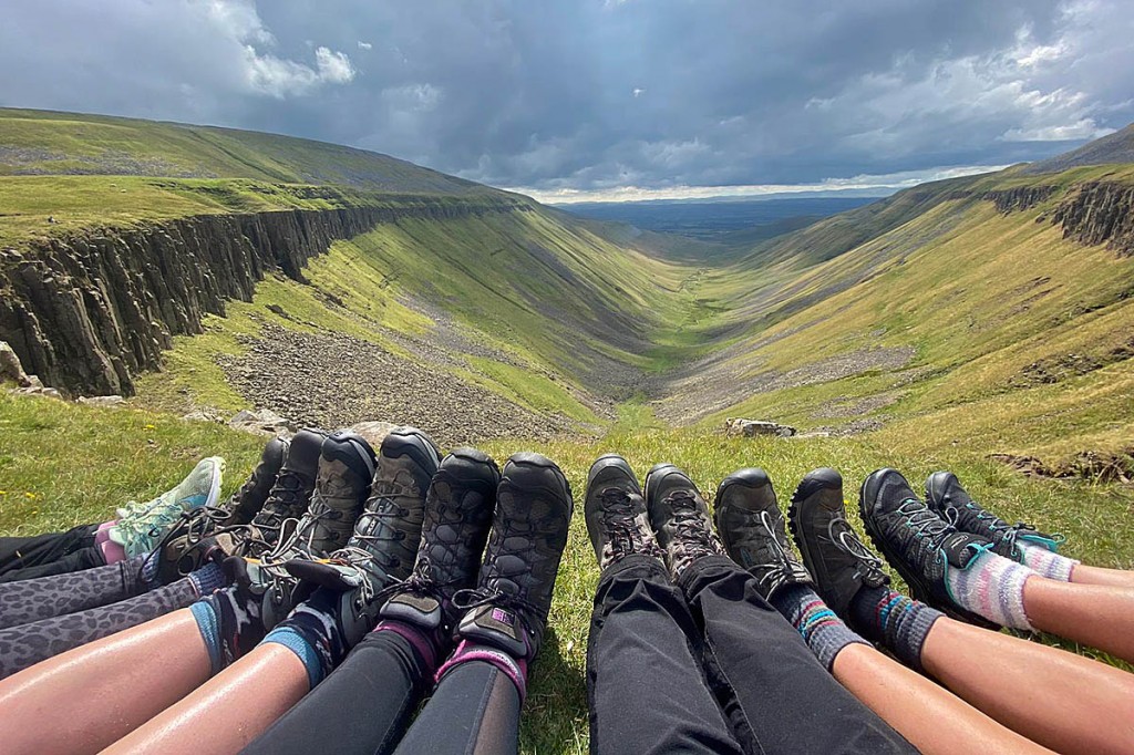 The Big Smile walkers enjoy a boot-level view of High Cup Nick in the North Pennines The Big Smile walkers enjoy a boot-level view of High Cup Nick in the North Pennines