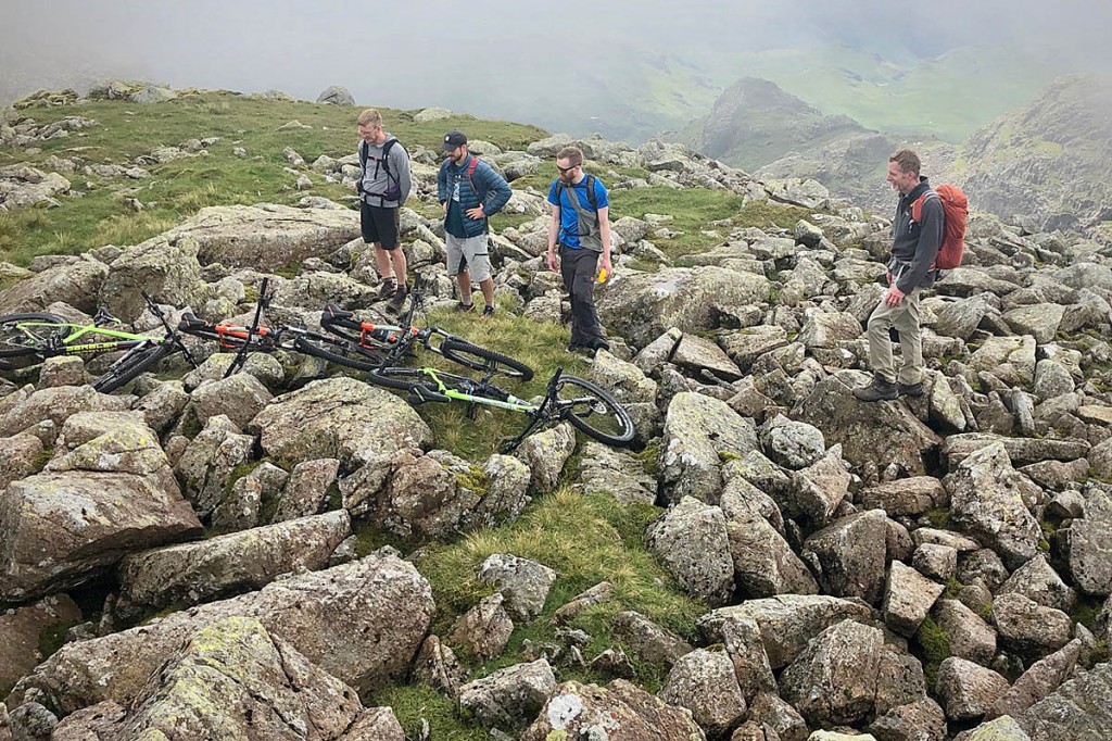 The hire shop team with the bikes abandoned on Broad Crag