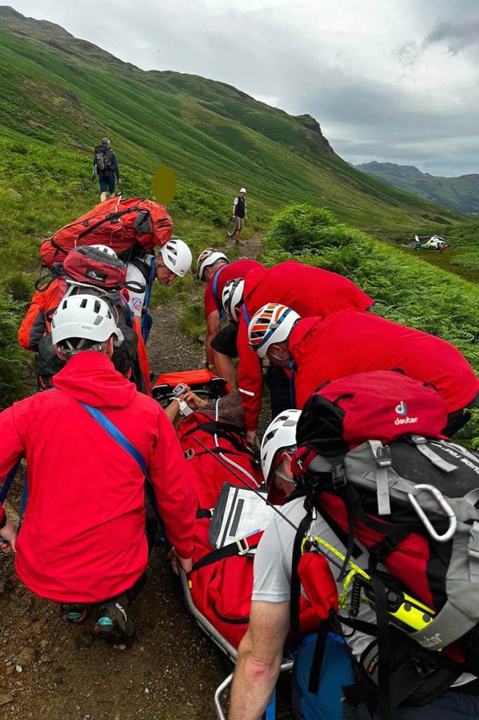 Wasdale team members prepare to stretcher an injured casualty in upper Eskdale. Photo: Wasdale MRT