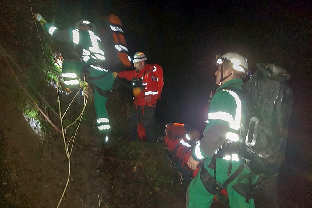 Rescuers at the site in the gorge at Henrhyd Falls. Photo: Western Beacons MSRT