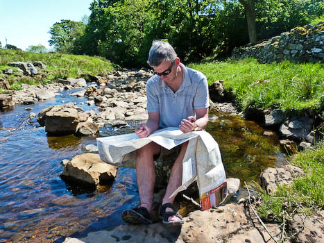 Jonathan Smith reads a map nr Askrigg in the Yorkshire Dales Jonathan Smith reads a map nr Askrigg in the Yorkshire Dales