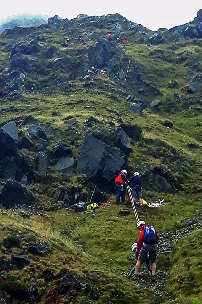 Team members bring the cragfast group to safety. Photo: Aberdyfi SRT Team members bring the cragfast group to safety. Photo: Aberdyfi SRT