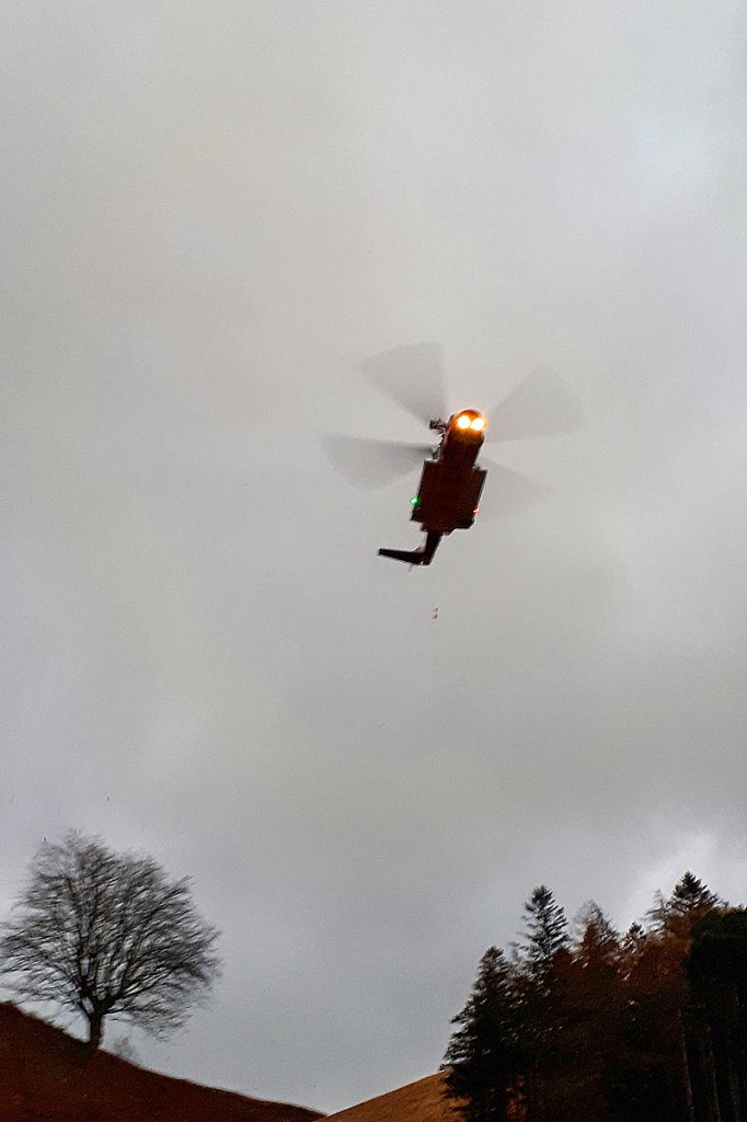 The Caernarfon Coastguard helicopter approaches the rescue scene. Photo: Aberdyfi SRT