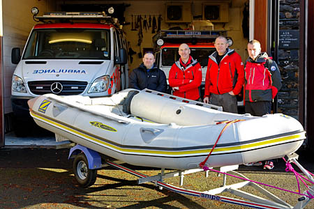 The Aberglaslyn team takes delivery of the boat from Keswick colleagues The Aberglaslyn team takes delivery of the boat from Keswick colleagues