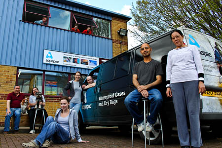 Aquapac's staff, and dogs, outside their office Aquapac's staff, and dogs, outside their office