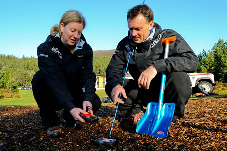 Minister Shona Robison learns about avalanche search and rescue techniques at the launch Minister Shona Robison learns about avalanche search and rescue techniques at the launch